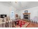 Cozy living room features a brick fireplace and hardwood floors at 196 Weston Rd., Pawleys Island, SC 29585