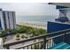 Condo balcony overlooking the beach with ocean views at 2001 S Ocean Blvd. S # 1013, Myrtle Beach, SC 29577