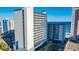 High-rise condo building with balconies overlooking the ocean at 2001 S Ocean Blvd. S # 1013, Myrtle Beach, SC 29577
