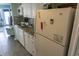 Cozy kitchen featuring granite countertops and white appliances at 2001 S Ocean Blvd. S # 1013, Myrtle Beach, SC 29577