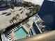 Aerial view of pool with lounge chairs and view of the ocean at 2001 S Ocean Blvd. S # 1013, Myrtle Beach, SC 29577
