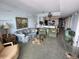 Spacious living room features unique decor and seamless flow to the open kitchen at 2100 Sea Mountain Hwy. # 520, North Myrtle Beach, SC 29582