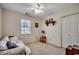Inviting bedroom with neutral carpeting, a sunny window, a daybed, and plenty of natural light at 220 Gateway Dr., Little River, SC 29566