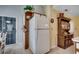 View of the kitchen featuring white appliances and an eat-in table with access to the porch at 220 Gateway Dr., Little River, SC 29566