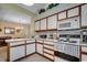 Open-concept kitchen with modern appliances and easy access to the dining area at 220 Gateway Dr., Little River, SC 29566