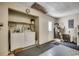 Practical laundry room featuring a washer, dryer, and access to the backyard at 220 Gateway Dr., Little River, SC 29566