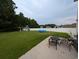 A backyard with patio furniture, a swing set, and an inflatable pool at 236 Haley Brooke Dr., Conway, SC 29526