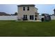 The backyard has a patio with furniture, a trampoline, and outdoor cooking space at 236 Haley Brooke Dr., Conway, SC 29526