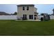 The backyard has a patio with furniture, a trampoline, and outdoor cooking space at 236 Haley Brooke Dr., Conway, SC 29526