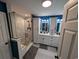 Sleek bathroom with a glass-enclosed shower, double vanity, and stylish modern finishes at 236 Haley Brooke Dr., Conway, SC 29526