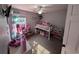 Bright bedroom with a loft bed, plush carpet, and an abundance of stuffed toys at 236 Haley Brooke Dr., Conway, SC 29526
