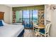 Comfortable space with small dining set overlooking the ocean, creating a relaxing and stylish ambiance at 2401 S Ocean Blvd. # 1262, Myrtle Beach, SC 29577