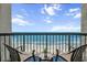 Oceanfront balcony view with two chairs, a small table, and scenic views of the beach and ocean at 2401 S Ocean Blvd. # 1262, Myrtle Beach, SC 29577