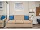 Bedroom featuring a pull-out sofa with bright blue pillows, providing extra sleeping space in a comfortable and functional area at 2401 S Ocean Blvd. # 1262, Myrtle Beach, SC 29577