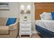 Cozy bedroom featuring a nightstand, lamps, and comfortable seating at 2401 S Ocean Blvd. # 1262, Myrtle Beach, SC 29577