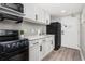 Clean kitchen with stainless steel appliances, white cabinetry, and a modern design at 2401 S Ocean Blvd. # 1262, Myrtle Beach, SC 29577