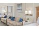 Bedroom featuring a pull-out sofa with bright blue pillows, providing extra sleeping space in a comfortable and functional area at 2401 S Ocean Blvd. # 1262, Myrtle Beach, SC 29577