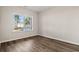 Neutral bedroom featuring hardwood floors and a bright window view at 250 Six Mile Creek Dr., Georgetown, SC 29440