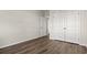 Neutral bedroom with hardwood floors and a double door closet at 250 Six Mile Creek Dr., Georgetown, SC 29440