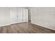Bedroom showcasing ample closet space and light hardwood flooring at 250 Six Mile Creek Dr., Georgetown, SC 29440