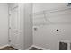 Laundry room features practical shelving and easy hookups for appliances at 250 Six Mile Creek Dr., Georgetown, SC 29440