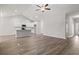 Open-concept living area with wood floors and white cabinets providing ample storage at 250 Six Mile Creek Dr., Georgetown, SC 29440