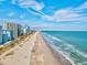 Expansive beach and ocean view with multiple resort properties along the coastline at 2504 N Ocean Blvd. # 1730, Myrtle Beach, SC 29577