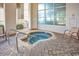 Cozy indoor hot tub with brick floors, seating, and a beautiful view at 2504 N Ocean Blvd. # 1730, Myrtle Beach, SC 29577