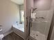 Modern bathroom featuring a separate shower and tub, enhanced by sleek fixtures and natural light at 2594 W Shore Dr., Longs, SC 29568