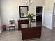 Spacious dining room featuring hardwood floors, a chandelier, and large mirror over a buffet at 2594 W Shore Dr., Longs, SC 29568