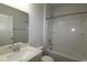 Bright bathroom featuring a shower-tub combination and a vanity with light toned cabinets and a marble countertop at 2681 Ophelia Way, Myrtle Beach, SC 29577