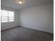 Bright bedroom with a large window and neutral carpet at 2681 Ophelia Way, Myrtle Beach, SC 29577