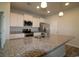 Beautiful kitchen with granite counters, stainless appliances, and a large center island with pendant lighting at 2681 Ophelia Way, Myrtle Beach, SC 29577