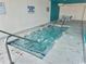 Indoor hot tub with bubbling water and metal railing at 2801 S Ocean Blvd. # 1535, North Myrtle Beach, SC 29582