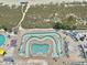 Aerial view shows a winding lazy river and spacious pool area with beach access at 2801 S Ocean Blvd. # 1535, North Myrtle Beach, SC 29582
