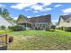 Spacious backyard view highlighting the home's patio, landscaping, and connection to nature at 2818 Sanctuary Blvd., Conway, SC 29526