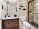 Modern bathroom featuring a single sink vanity and a walk-in shower with tiled walls at 2818 Sanctuary Blvd., Conway, SC 29526