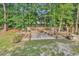Relaxing outdoor fire pit area, creating a cozy space for gathering with Gathering and friends at 2818 Sanctuary Blvd., Conway, SC 29526