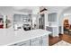 Bright kitchen featuring gray cabinets, stainless steel appliances, and a white countertop island, creating a stylish space at 2818 Sanctuary Blvd., Conway, SC 29526