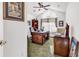 Well-appointed home office with a large desk, comfortable seating, and natural light at 2818 Sanctuary Blvd., Conway, SC 29526