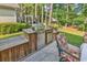 Built-in outdoor kitchen featuring a BBQ grill, counter space and under-counter refrigerator for outdoor entertaining at 2818 Sanctuary Blvd., Conway, SC 29526