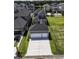 Home with three car garage featuring a long concrete driveway at 287 West Palms Dr., Myrtle Beach, SC 29579
