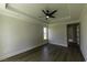 Bedroom with tray ceiling and modern ceiling fan at 287 West Palms Dr., Myrtle Beach, SC 29579