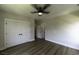 Bedroom with ceiling fan, wood-look floors and features closet with double doors at 287 West Palms Dr., Myrtle Beach, SC 29579