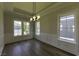 Bright dining room featuring hardwood floors, modern lighting, and ample natural light at 287 West Palms Dr., Myrtle Beach, SC 29579