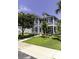 Charming two-story home with inviting entrance, well-manicured lawn, and lush landscaping at 287 West Palms Dr., Myrtle Beach, SC 29579