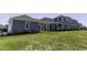 Back side of new construction home featuring covered breezeway and patio at 287 West Palms Dr., Myrtle Beach, SC 29579