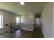 Upstairs hallway with hardwood floors and craftsman style railing on the stairs at 287 West Palms Dr., Myrtle Beach, SC 29579