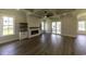 Spacious living room with fireplace and access to outdoor patio at 287 West Palms Dr., Myrtle Beach, SC 29579