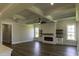 Cozy living room features a modern fireplace and built-in shelving at 287 West Palms Dr., Myrtle Beach, SC 29579